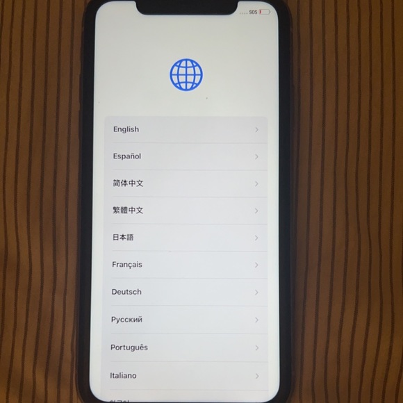 iPhone 11 with case and a charger